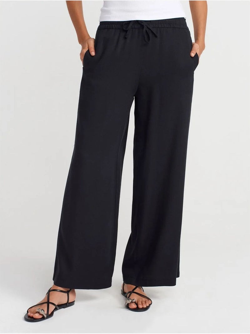 Pantalón de pernera ancha de tencel con cintura con cordón dilvin Negro - Kiabi