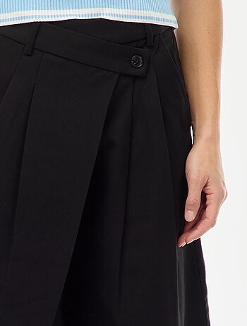 Pantalón de pinzas asimétrico