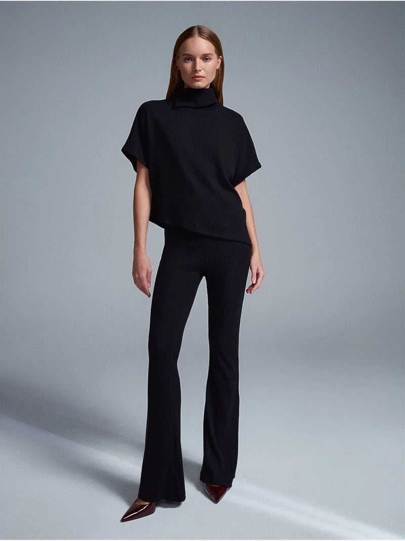 Pantalón de punto acampanado de tiro alto Negro - Kiabi