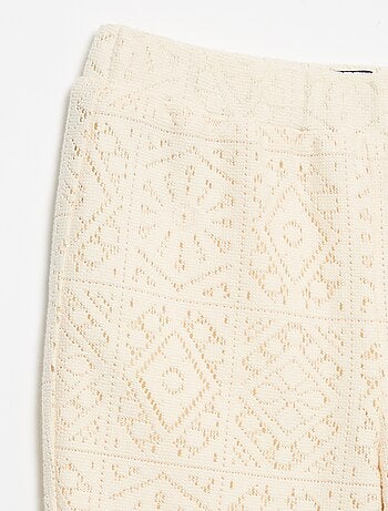 Pantalón de punto efecto ganchillo corte flare