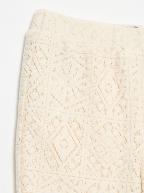 Pantalón de punto efecto ganchillo corte flare - Kiabi Pantalón de punto efecto ganchillo corte flare - Kiabi
