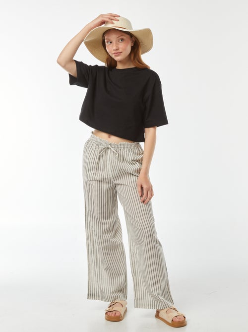 Pantalón de rayas finas con flecos - Kiabi