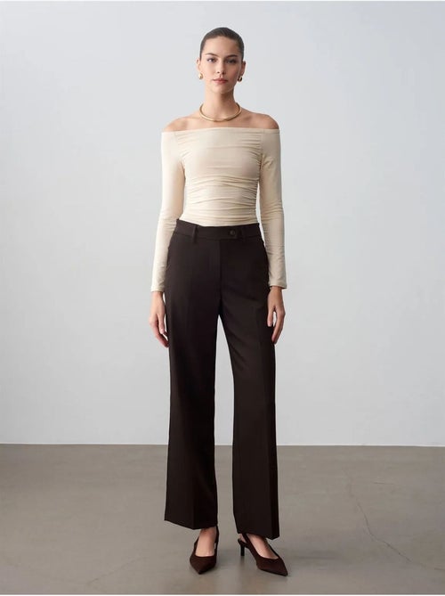 Pantalón de tejido de pernera ancha y tiro medio dilvin - Kiabi Pantalón de tejido de pernera ancha y tiro medio dilvin - Kiabi