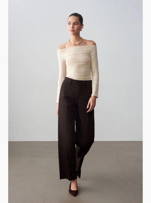 Pantalón de tejido de pernera ancha y tiro medio dilvin - Kiabi Pantalón de tejido de pernera ancha y tiro medio dilvin - Kiabi
