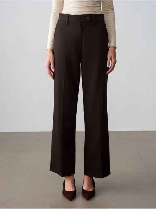 Pantalón de tejido de pernera ancha y tiro medio dilvin - Kiabi Pantalón de tejido de pernera ancha y tiro medio dilvin - Kiabi
