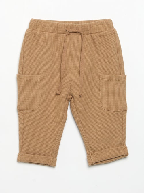 Pantalón de tejido gofrado con bolsillos laterales - Kiabi