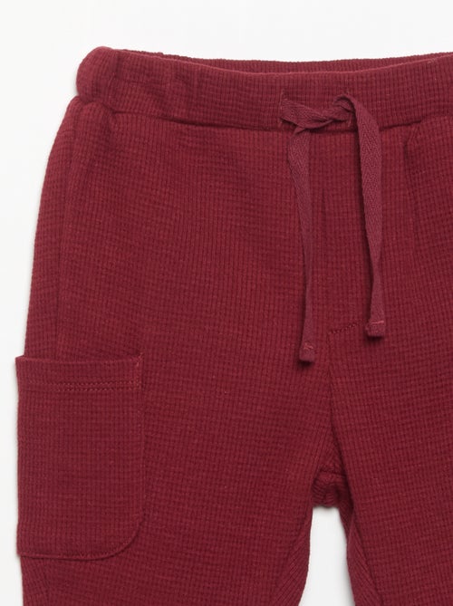 Pantalón de tejido gofrado con bolsillos laterales - Kiabi