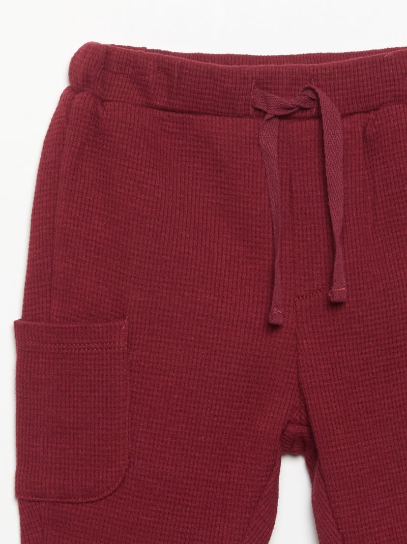 Pantalón de tejido gofrado con bolsillos laterales Rojo - Kiabi
