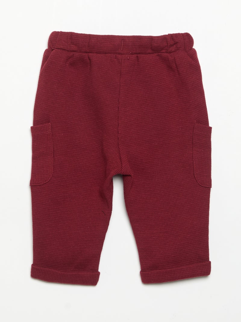 Pantalón de tejido gofrado con bolsillos laterales Rojo - Kiabi