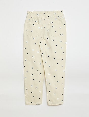 Pantalón denim corte mom con estampado