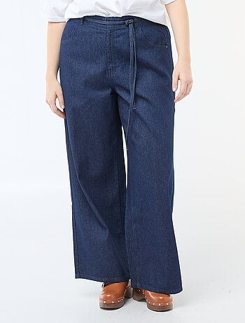 Pantalón denim / vaquero de tiro bajo y corte ancho