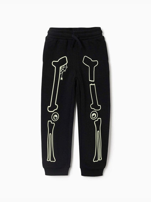 Pantalón deportivo con estampado que brilla en la oscuridad - Kiabi Pantalón deportivo con estampado que brilla en la oscuridad - Kiabi
