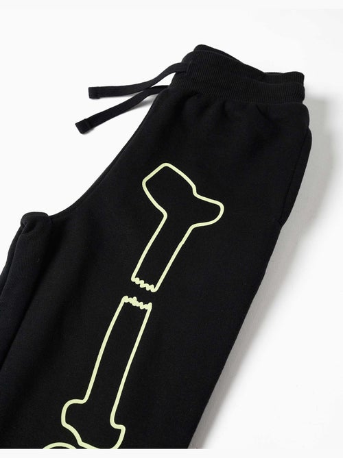 Pantalón deportivo con estampado que brilla en la oscuridad - Kiabi Pantalón deportivo con estampado que brilla en la oscuridad - Kiabi