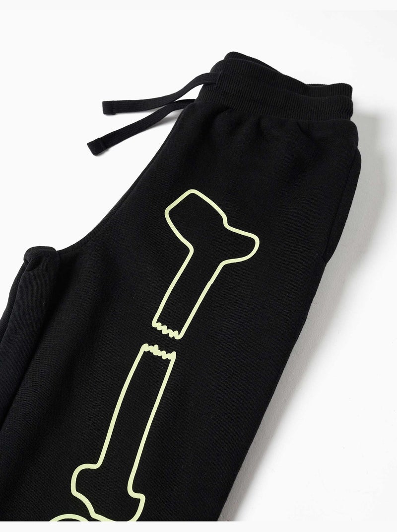 Pantalón deportivo con estampado que brilla en la oscuridad Negro Negro - Kiabi