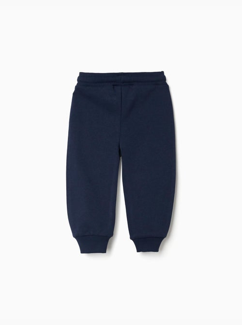 Pantalón deportivo de algodón con estampado Super Friends - Kiabi Pantalón deportivo de algodón con estampado Super Friends - Kiabi