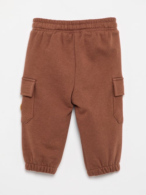 Pantalón 'Disney' con bolsillos cargo - Kiabi Pantalón 'Disney' con bolsillos cargo - Kiabi