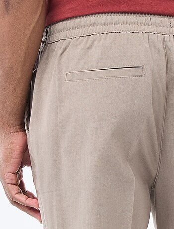 Pantalón estilo "jogger" liso