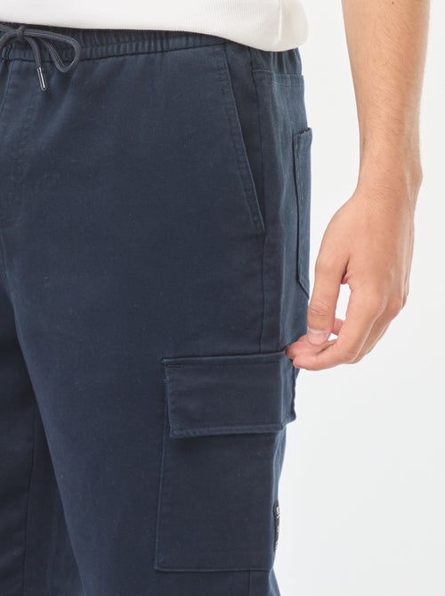 Pantalón estilo 'jogger' multibolsillos - Kiabi