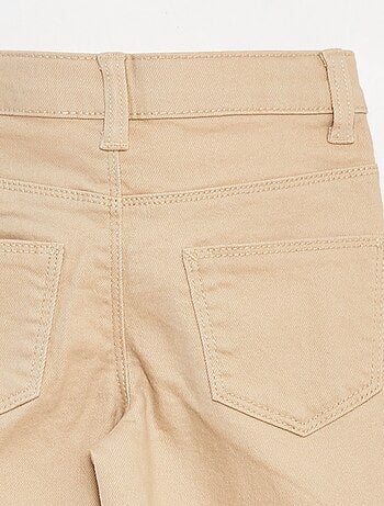Pantalón flare - Corte más ajustado