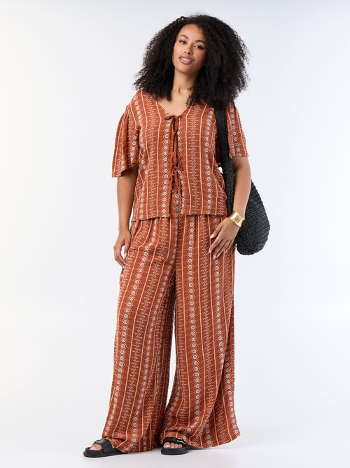 Pantalón fluido con bordados - Kiabi Pantalón fluido con bordados - Kiabi
