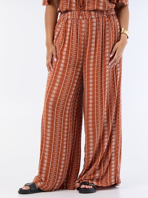 Pantalón fluido con bordados - Kiabi Pantalón fluido con bordados - Kiabi