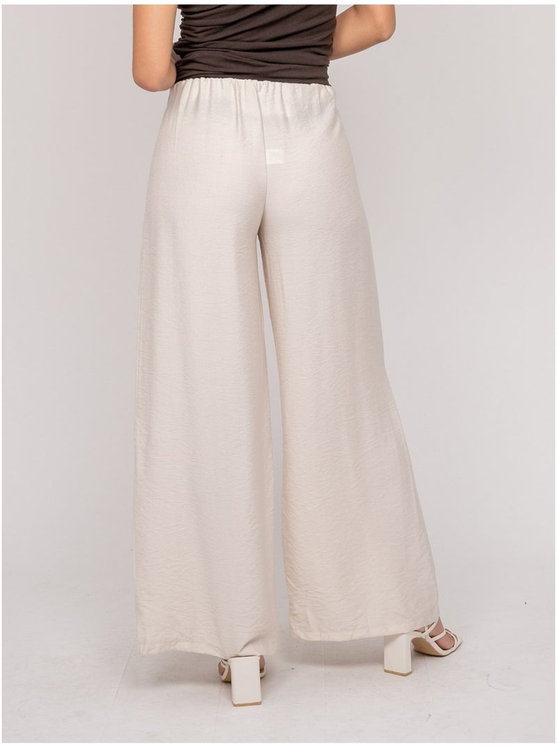 Pantalón fluido EJORDIE Crudo - Kiabi