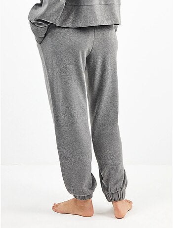 Pantalón jogger con bolsillos y cintura ajustable, en tejido de felpa