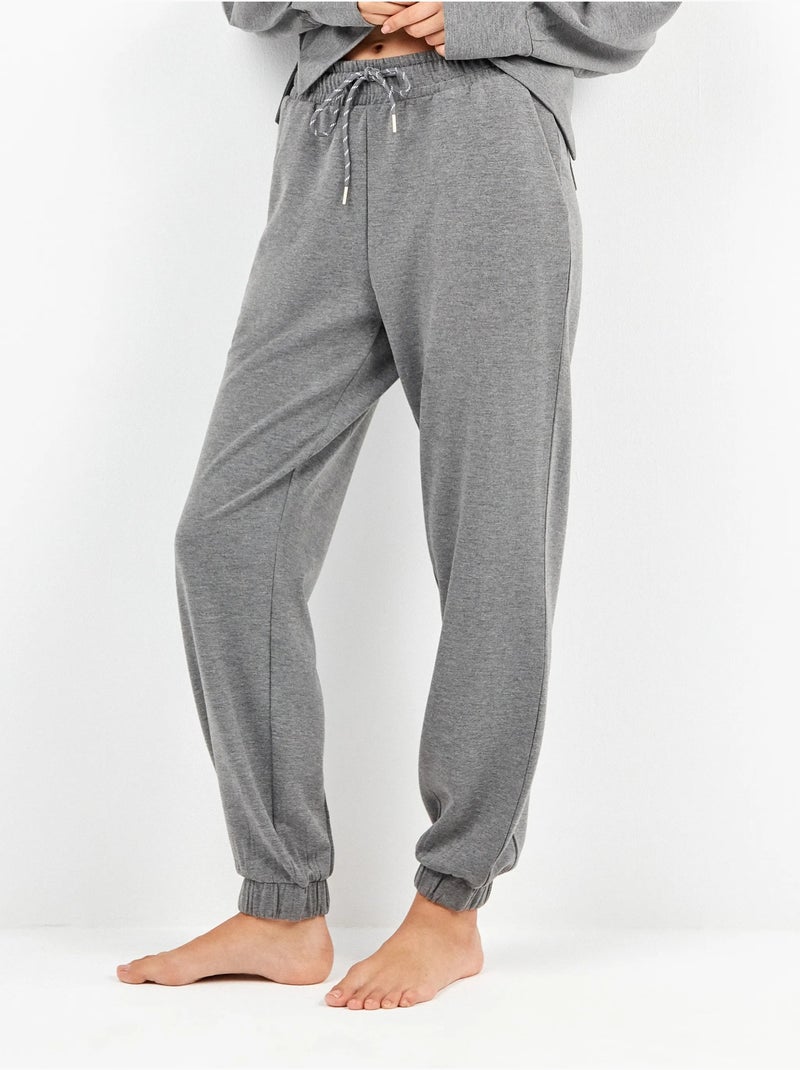 Pantalón jogger con bolsillos y cintura ajustable, en tejido de felpa Gris jaspeado - Kiabi