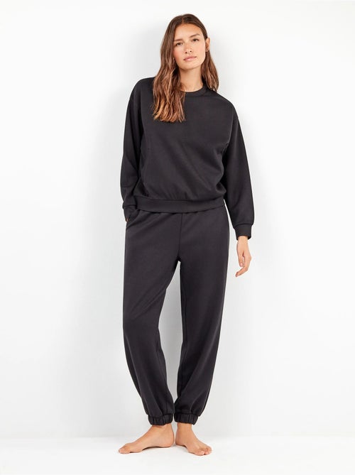 Pantalón jogger con cintura ajustable en tejido soft touch - Kiabi Pantalón jogger con cintura ajustable en tejido soft touch - Kiabi