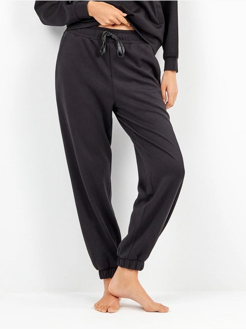 Pantalón jogger con cintura ajustable en tejido soft touch - Kiabi Pantalón jogger con cintura ajustable en tejido soft touch - Kiabi