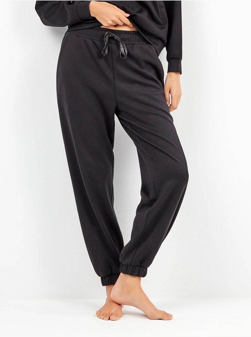 Pantalón jogger con cintura ajustable en tejido soft touch Negro - Kiabi