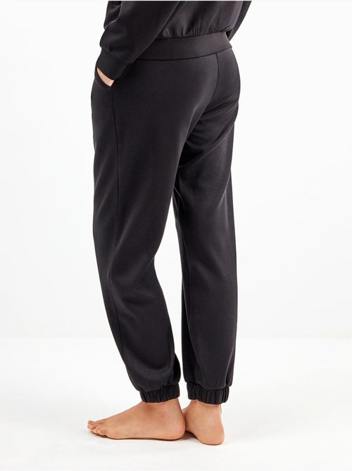 Pantalón jogger con cintura ajustable en tejido soft touch - Kiabi Pantalón jogger con cintura ajustable en tejido soft touch - Kiabi