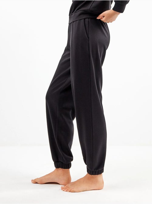 Pantalón jogger con cintura ajustable en tejido soft touch - Kiabi Pantalón jogger con cintura ajustable en tejido soft touch - Kiabi