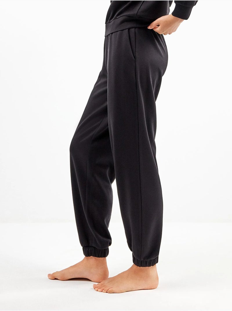 Pantalón jogger con cintura ajustable en tejido soft touch Negro - Kiabi