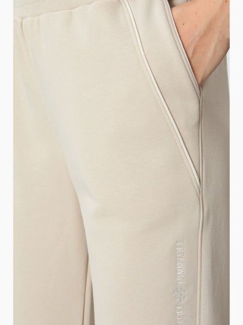 Pantalón jogger de chándal de mezcla de algodón para mujer tommy - Kiabi Pantalón jogger de chándal de mezcla de algodón para mujer tommy - Kiabi