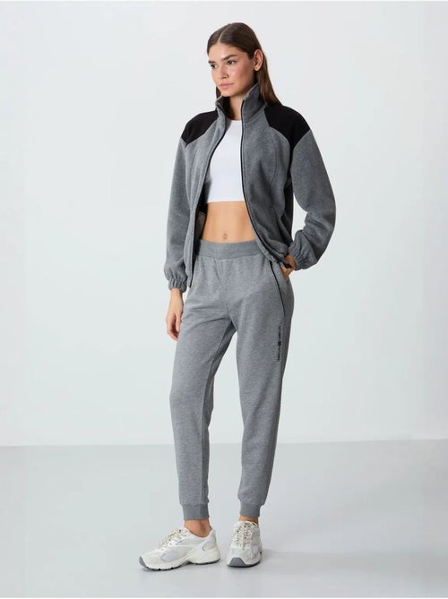 Pantalón jogger de chándal de mezcla de algodón para mujer tommy - Kiabi Pantalón jogger de chándal de mezcla de algodón para mujer tommy - Kiabi