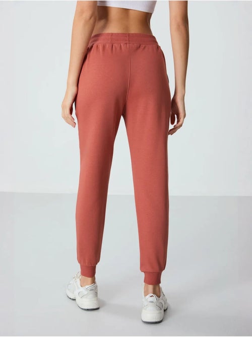 Pantalón jogger de chándal de mezcla de algodón para mujer tommy - Kiabi Pantalón jogger de chándal de mezcla de algodón para mujer tommy - Kiabi