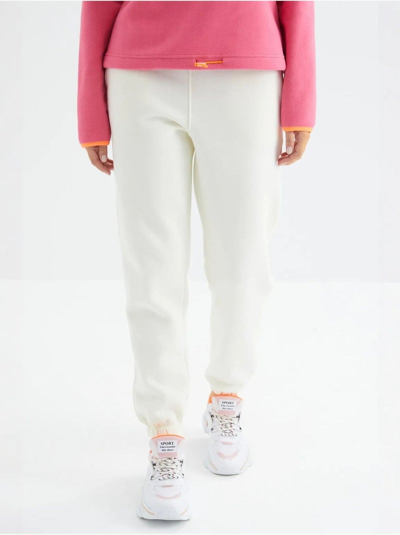 Pantalón jogger de felpa polar de tiro alto para mujer tommy Blanco roto - Kiabi