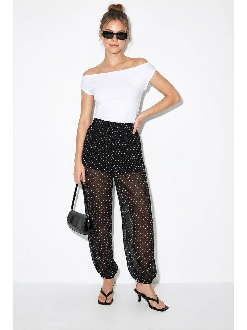 Pantalón jogger de gasa con lunares lucci Negro - Kiabi