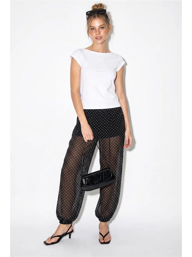 Pantalón jogger de gasa con lunares lucci Negro - Kiabi