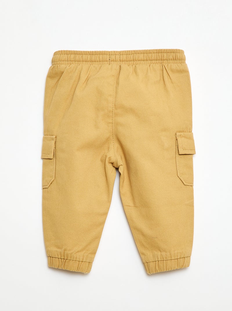 Pantalón jogger de sarga con bolsillos con solapa Amarillo - Kiabi