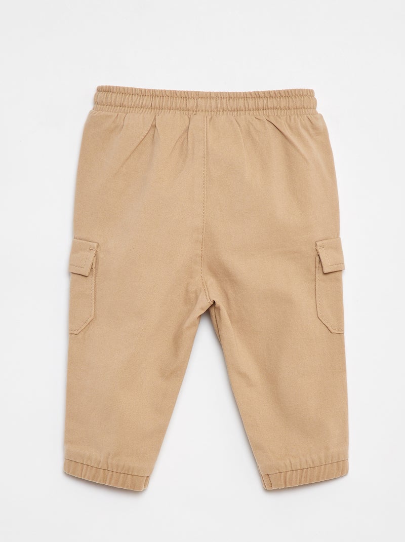 Pantalón jogger de sarga con bolsillos con solapa Beige - Kiabi