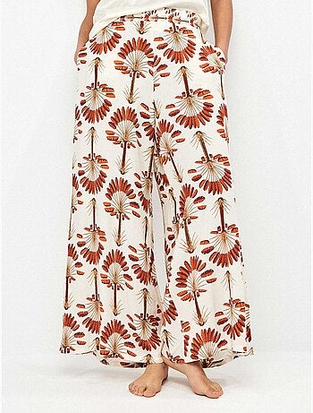 Pantalón largo ancho con estampado de palmeras