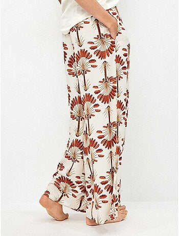 Pantalón largo ancho con estampado de palmeras