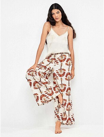 Pantalón largo ancho con estampado de palmeras