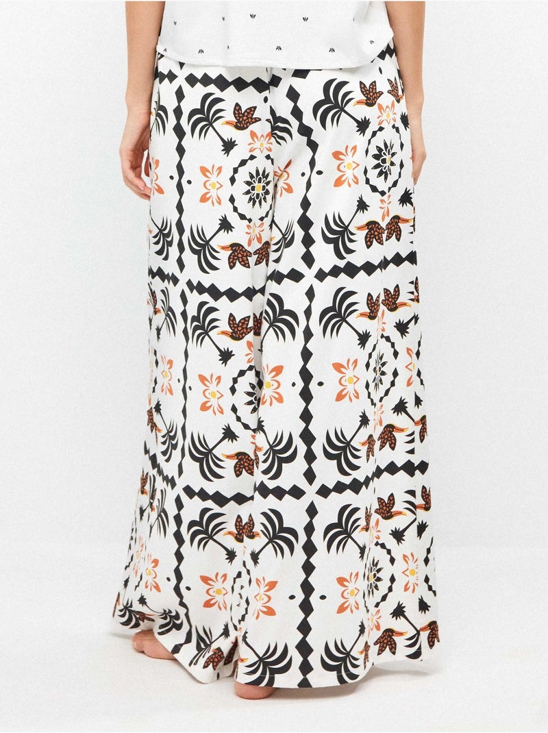 Pantalón largo ancho con estampado tropical con algodón Multicolor - Kiabi