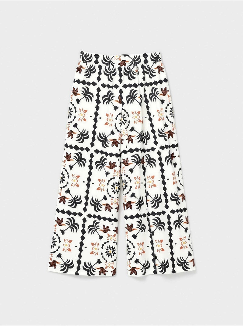 Pantalón largo ancho con estampado tropical con algodón Multicolor - Kiabi
