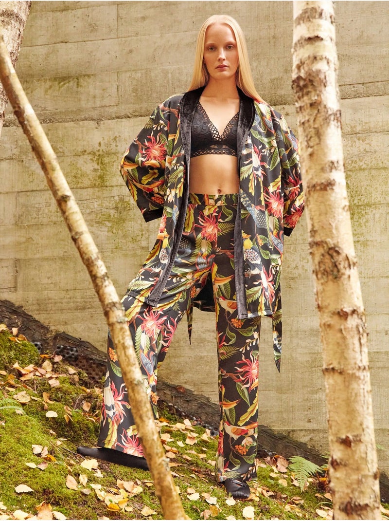 Pantalón largo con estampado tropical en tejido de satén Multicolor - Kiabi