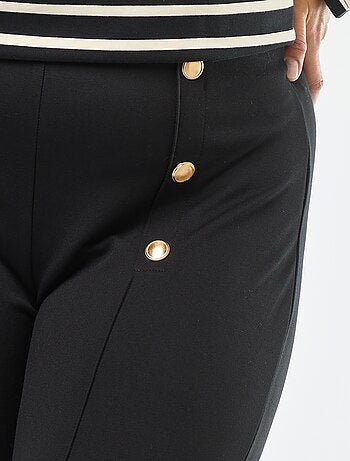 Pantalón legging liso de talle alto con botones dorados