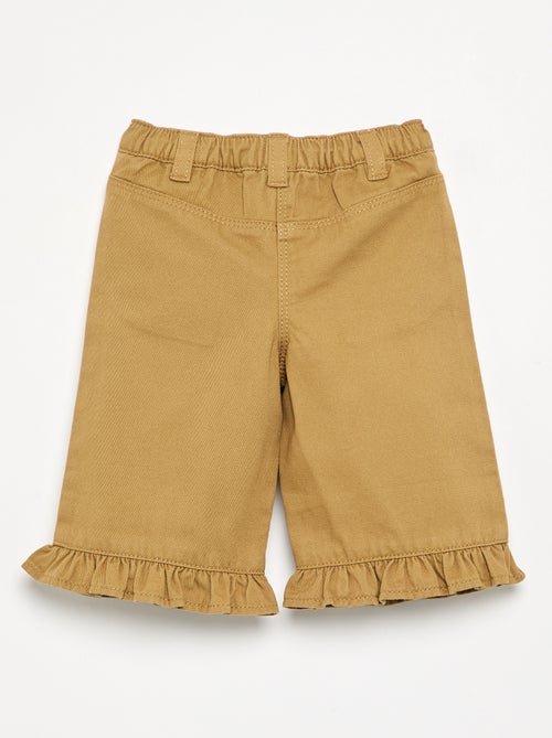 Pantalón liso con bajo volanteado - Kiabi Pantalón liso con bajo volanteado - Kiabi